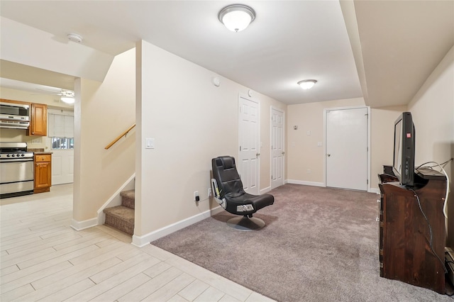 10 Jennifer Ln, Carmel, NY 10512 - unfurnished room featuring stairway, ceiling fan, and light carpet
