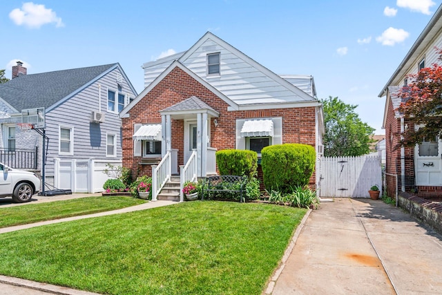 46-27 195th St, Flushing, NY 11358 - bungalow-style home with a gate and brick siding