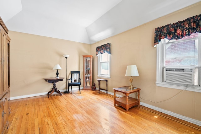 46-27 195th St, Flushing, NY 11358 - sitting room with light wood-type flooring, lofted ceiling, and cooling unit