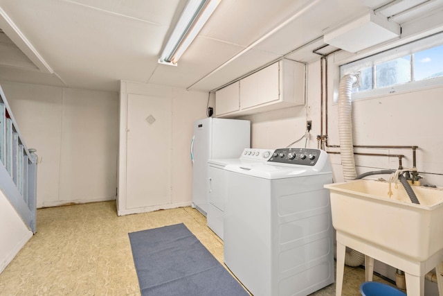 46-27 195th St, Flushing, NY 11358 - laundry area featuring separate washer and dryer, cabinet space, and light floors