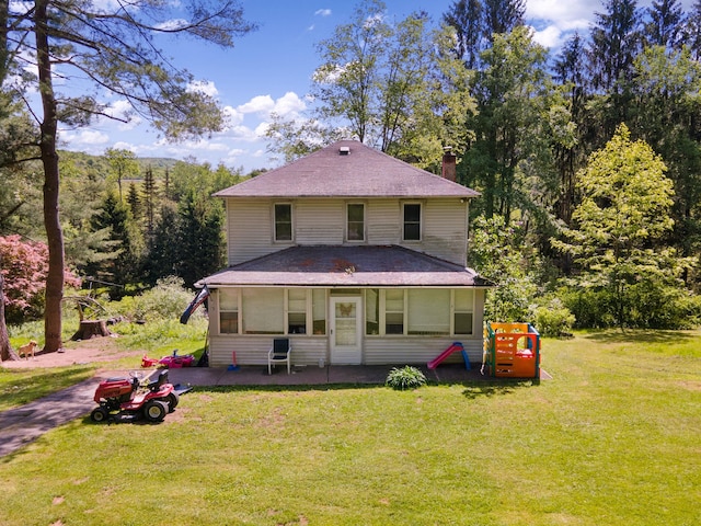 41-59 Fox Mountain Rd, Livingston Manor, NY 12758 - back of house featuring a yard, a chimney, and roof with shingles