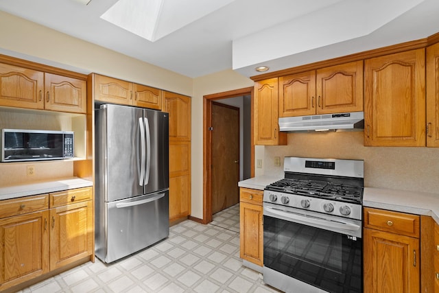 41-59 Fox Mountain Rd, Livingston Manor, NY 12758 - kitchen with stainless steel appliances, under cabinet range hood, light flooring, and light countertops