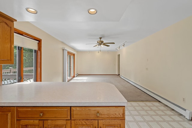 41-59 Fox Mountain Rd, Livingston Manor, NY 12758 - kitchen featuring a baseboard radiator, light countertops, a ceiling fan, rail lighting, and recessed lighting