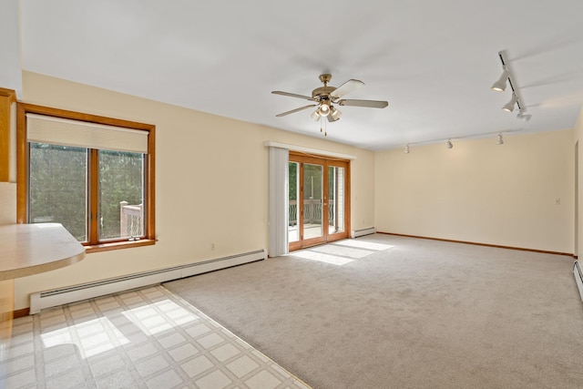41-59 Fox Mountain Rd, Livingston Manor, NY 12758 - unfurnished room with baseboard heating, rail lighting, and a ceiling fan