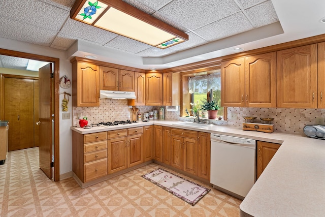 41-59 Fox Mountain Rd, Livingston Manor, NY 12758 - kitchen with white appliances, under cabinet range hood, light floors, light countertops, and a paneled ceiling