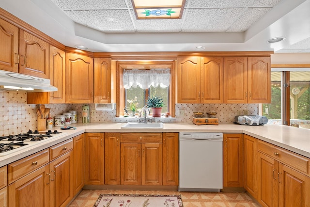 41-59 Fox Mountain Rd, Livingston Manor, NY 12758 - kitchen with white appliances, backsplash, light countertops, and brown cabinets