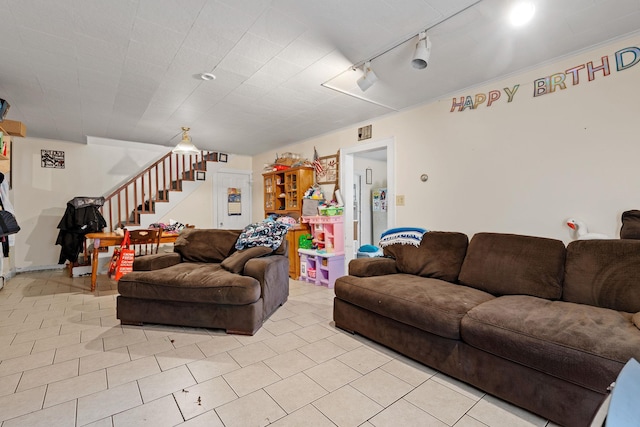 41-59 Fox Mountain Rd, Livingston Manor, NY 12758 - living area featuring stairway, light tile patterned floors, and rail lighting