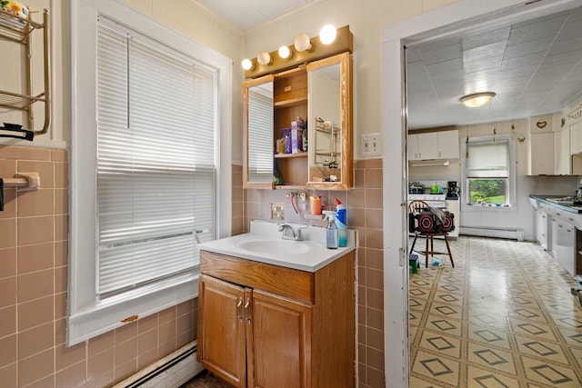 41-59 Fox Mountain Rd, Livingston Manor, NY 12758 - bathroom featuring tile walls, vanity, and a baseboard radiator