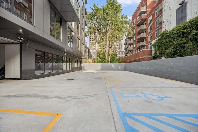 168 E 111th St Unit 8B, New York Manhattan, NY 10029 - view of uncovered parking lot
