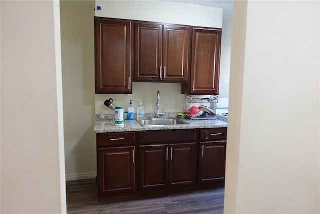 4120 Murdock Ave, Bronx, NY 10466 - kitchen with dark wood-type flooring and dark brown cabinets