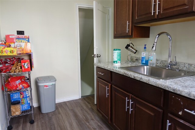 4120 Murdock Ave, Bronx, NY 10466 - kitchen featuring dark wood-type flooring and dark brown cabinetry