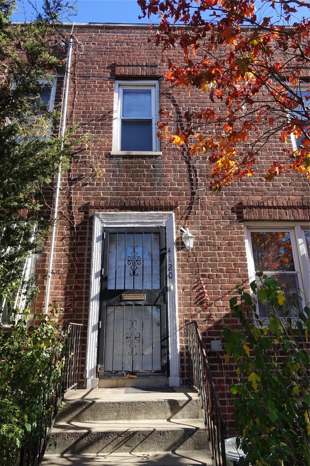 4120 Murdock Ave, Bronx, NY 10466 - doorway to property featuring brick siding