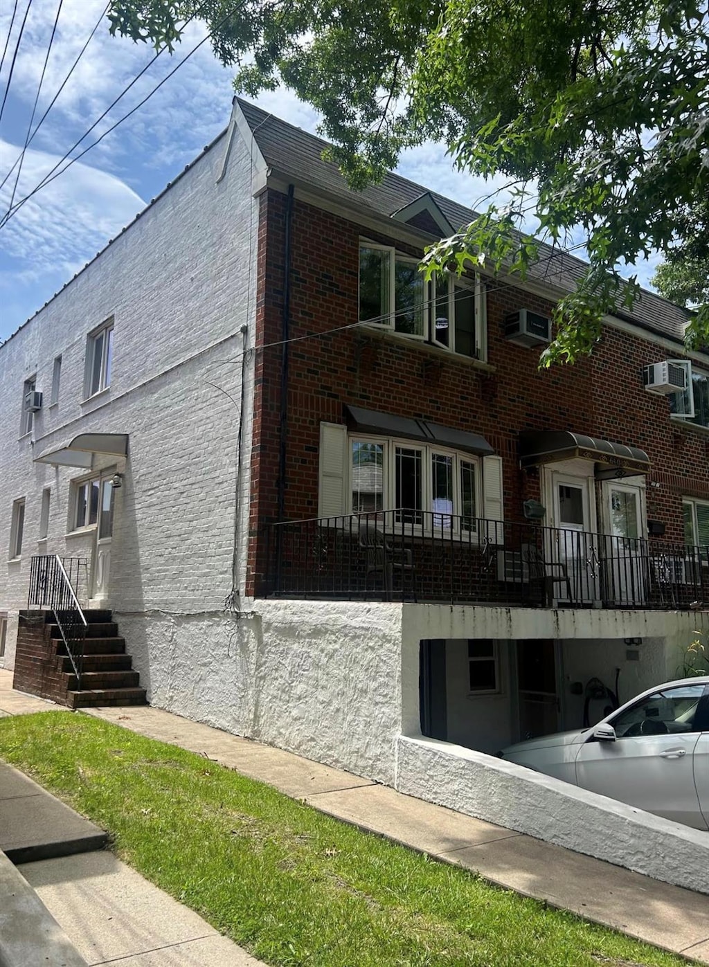 6404 78th St, Middle Village, NY 11379 - view of home's exterior featuring brick siding