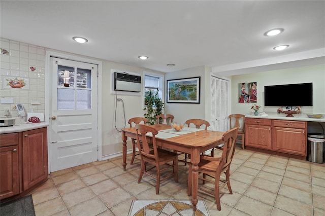 6404 78th St, Middle Village, NY 11379 - dining space with an AC wall unit, light tile patterned flooring, and recessed lighting