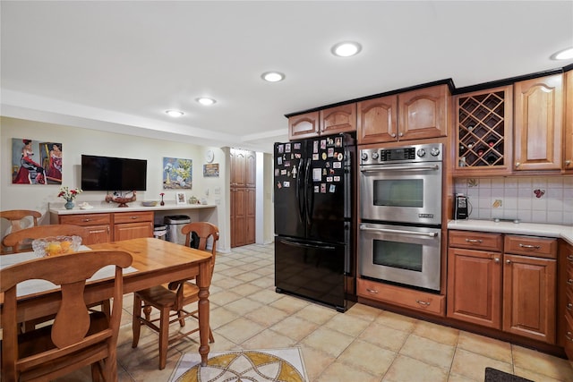 6404 78th St, Middle Village, NY 11379 - kitchen featuring freestanding refrigerator, stainless steel double oven, light countertops, tasteful backsplash, and recessed lighting