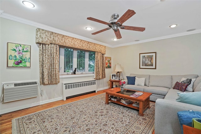 6404 78th St, Middle Village, NY 11379 - living area featuring radiator, wood finished floors, crown molding, ceiling fan, and recessed lighting