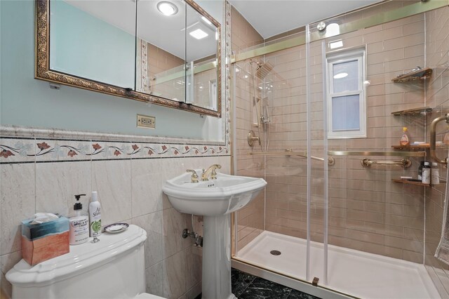 6404 78th St, Middle Village, NY 11379 - full bath featuring a stall shower, tile walls, and wainscoting