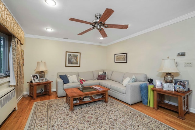 6404 78th St, Middle Village, NY 11379 - living area featuring radiator, a ceiling fan, crown molding, light wood finished floors, and recessed lighting