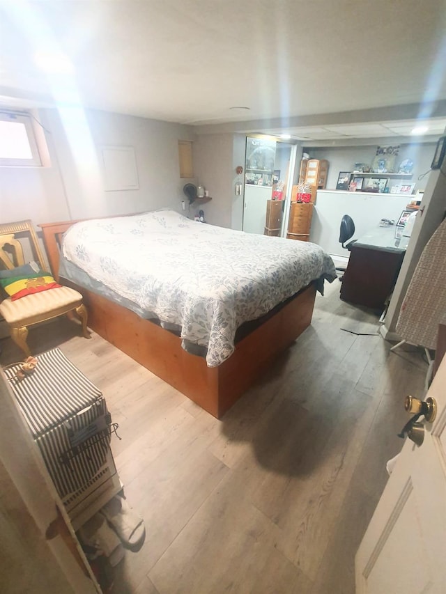12826 Gotham Rd, South Ozone Park, NY 11420 - bedroom featuring wood finished floors