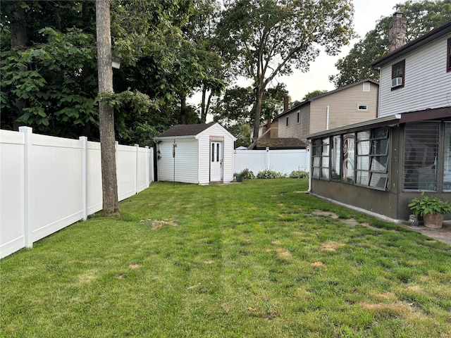 179 Clinton Ave, East Patchogue, NY 11772 - fenced backyard featuring a sunroom and a shed