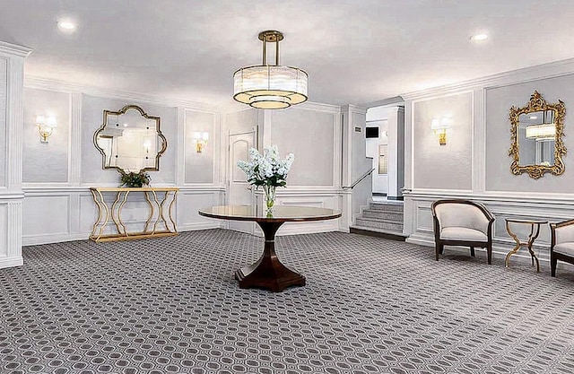 69-10 108th St Unit 1N, Forest Hills, NY 11375 - hallway with a decorative wall, carpet, crown molding, and recessed lighting