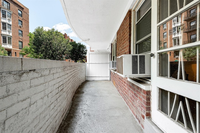 69-10 108th St Unit 1N, Forest Hills, NY 11375 - view of property exterior with brick siding and cooling unit