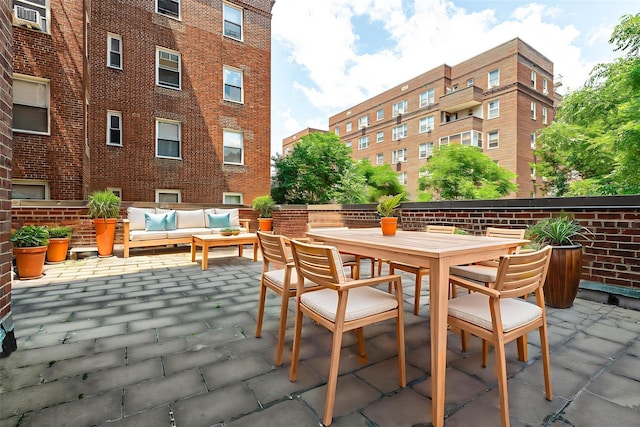 69-10 108th St Unit 1N, Forest Hills, NY 11375 - view of patio featuring outdoor lounge area and outdoor dining area