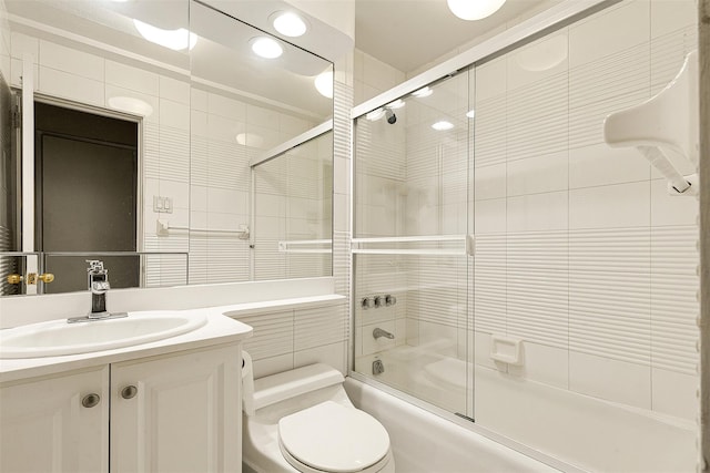 69-10 108th St Unit 1N, Forest Hills, NY 11375 - bathroom featuring enclosed tub / shower combo, vanity, and tile walls