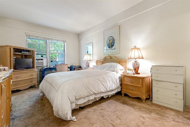 69-10 108th St Unit 1N, Forest Hills, NY 11375 - bedroom with light carpet and access to exterior