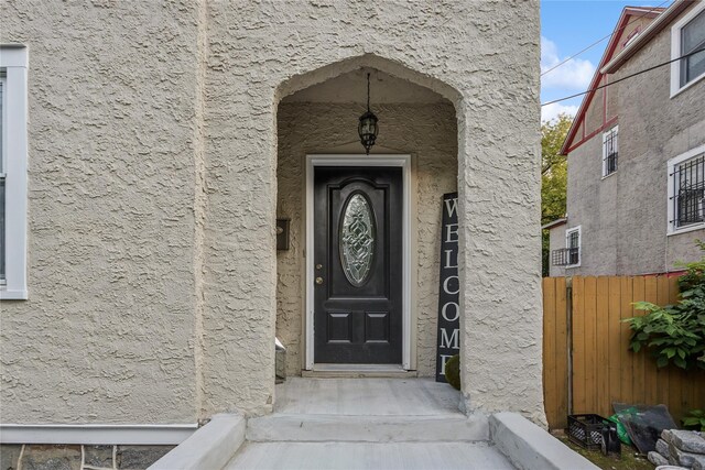 222 E 4th St, Mount Vernon, NY 10553 - entrance to property featuring stucco siding