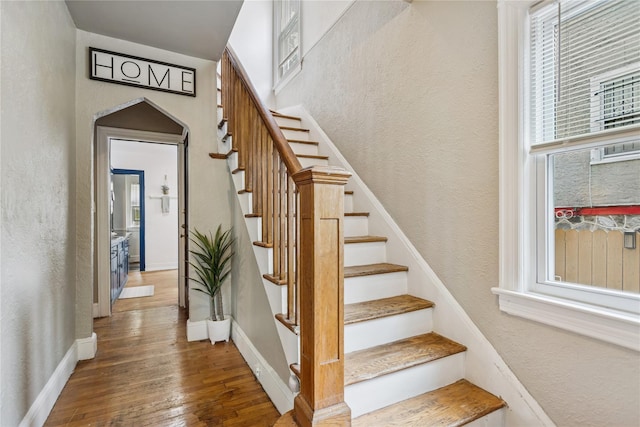 222 E 4th St, Mount Vernon, NY 10553 - stairs featuring wood finished floors and a textured wall