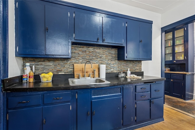222 E 4th St, Mount Vernon, NY 10553 - kitchen featuring blue cabinetry and decorative backsplash