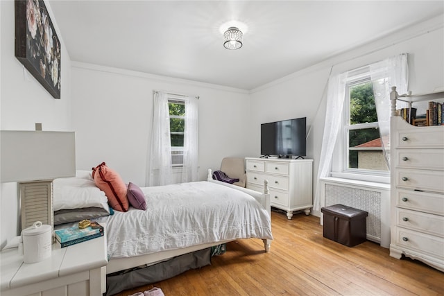 222 E 4th St, Mount Vernon, NY 10553 - bedroom featuring light wood-type flooring and ornamental molding