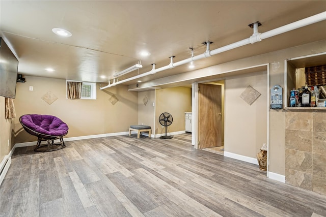 222 E 4th St, Mount Vernon, NY 10553 - below grade area featuring wood finished floors and recessed lighting