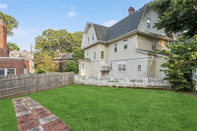 222 E 4th St, Mount Vernon, NY 10553 - rear view of house with roof with shingles, a chimney, and a gambrel roof