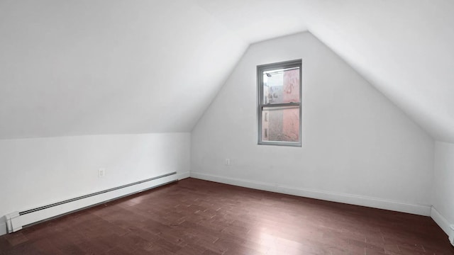 1823 Anthony Ave, Bronx, NY 10457 - bonus room with baseboard heating, vaulted ceiling, and dark wood finished floors
