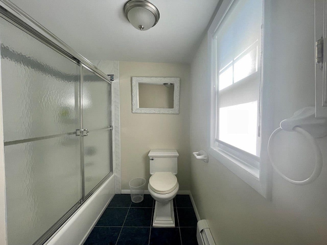 390 Atlantic Ave, East Rockaway, NY 11518 - bathroom with tile patterned floors, enclosed tub / shower combo, and a baseboard radiator