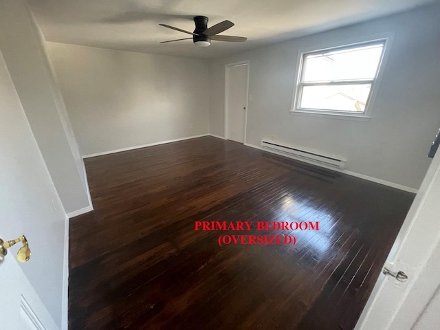 390 Atlantic Ave, East Rockaway, NY 11518 - spare room with a baseboard radiator, hardwood / wood-style floors, and ceiling fan