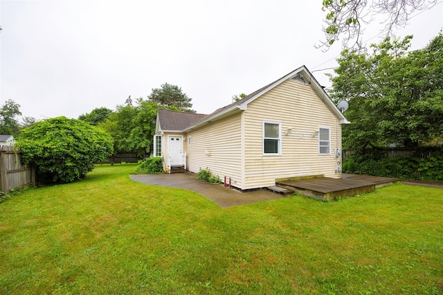 10 Tobacco Ln, Red Hook, NY 12571 - back of property featuring a fenced backyard, a deck, a patio, and entry steps