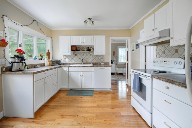 10 Tobacco Ln, Red Hook, NY 12571 - kitchen with white appliances, under cabinet range hood, white cabinetry, backsplash, and healthy amount of natural light