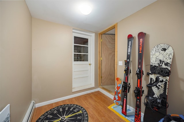 10 Tobacco Ln, Red Hook, NY 12571 - foyer with a baseboard heating unit and wood finished floors