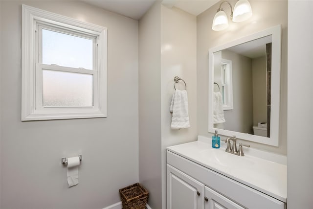393 S 4th St, Lindenhurst, NY 11757 - bathroom featuring toilet and vanity