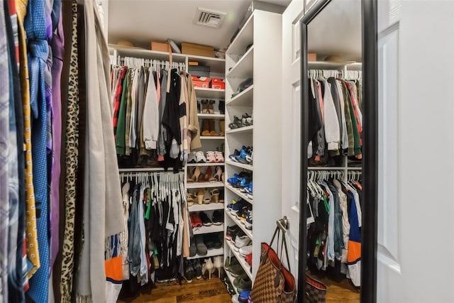 393 S 4th St, Lindenhurst, NY 11757 - walk in closet featuring wood finished floors
