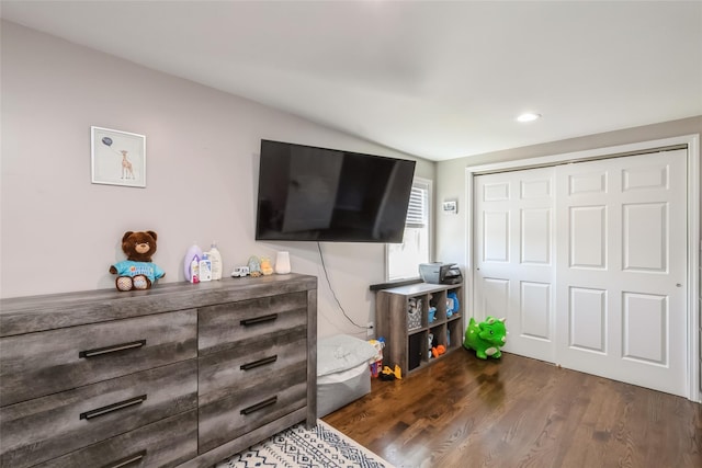 393 S 4th St, Lindenhurst, NY 11757 - bedroom with dark wood finished floors, a closet, vaulted ceiling, and recessed lighting