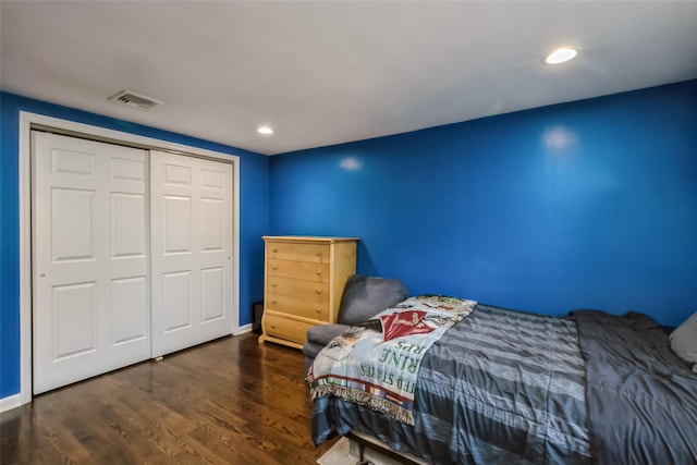 393 S 4th St, Lindenhurst, NY 11757 - bedroom featuring wood finished floors, recessed lighting, and a closet