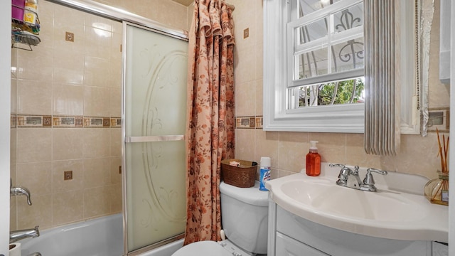 89-10 189th St, Hollis, NY 11423 - full bath with vanity, enclosed tub / shower combo, tile walls, and tasteful backsplash