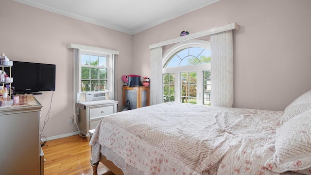 89-10 189th St, Hollis, NY 11423 - bedroom featuring multiple windows, wood finished floors, ornamental molding, and cooling unit