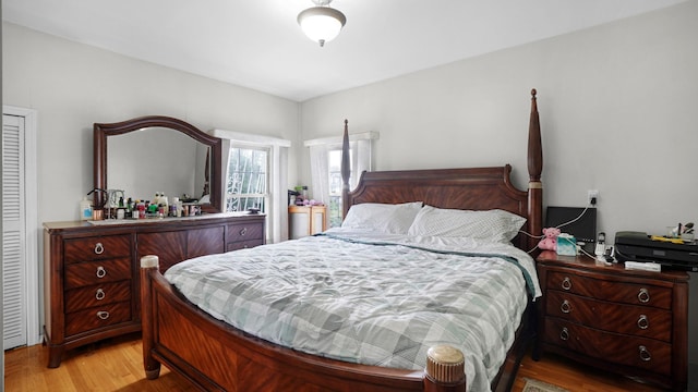 89-10 189th St, Hollis, NY 11423 - bedroom with light wood finished floors