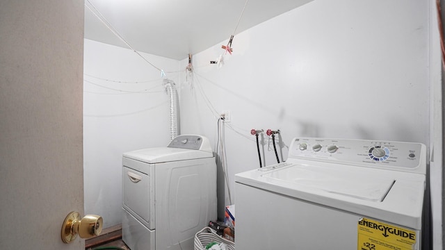 89-10 189th St, Hollis, NY 11423 - washroom with washing machine and clothes dryer