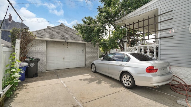 89-10 189th St, Hollis, NY 11423 - garage featuring concrete driveway